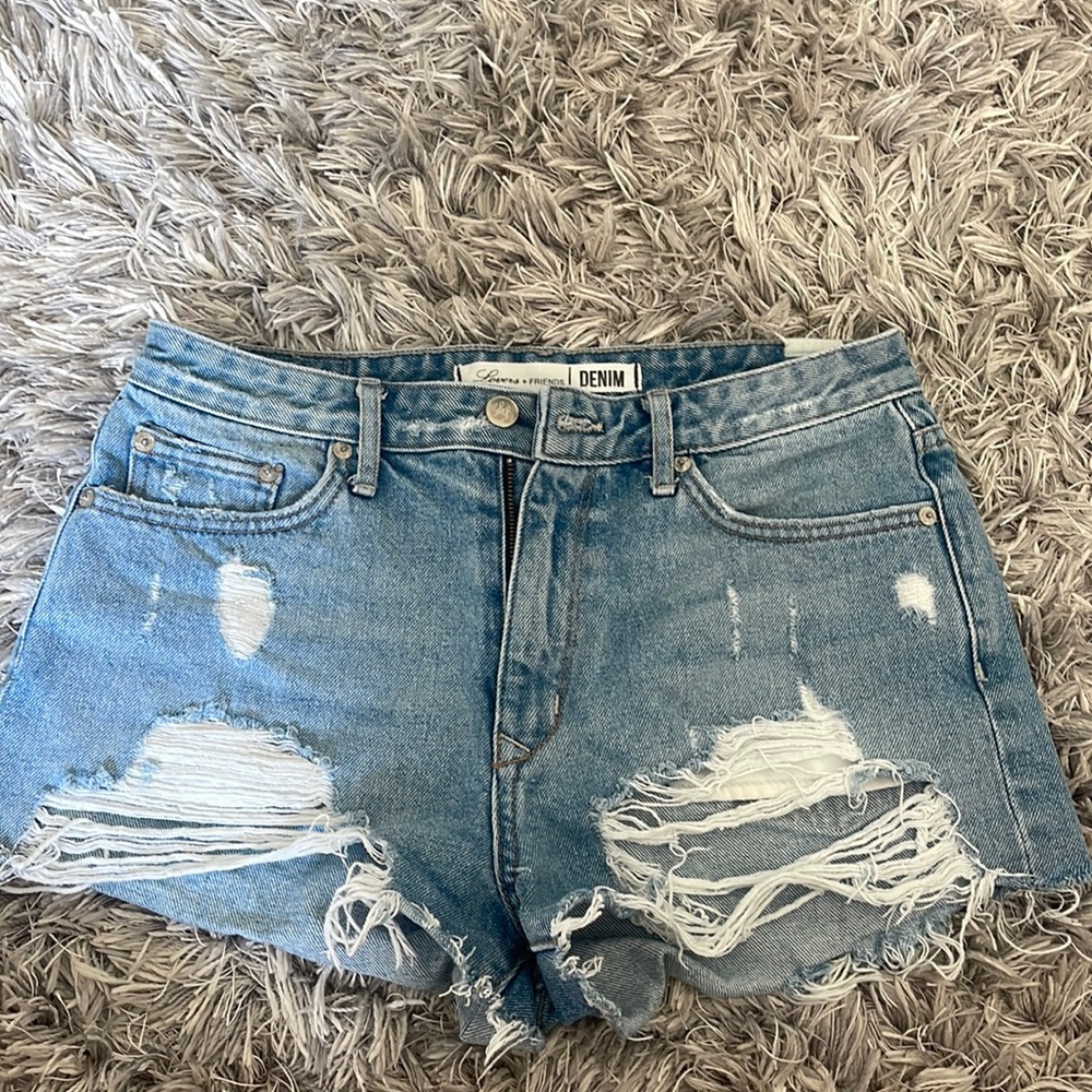 Lovers + friends from Revolve. High waisted and distressed denim shorts
